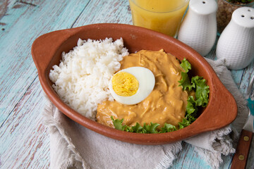 Aji de gallina chicken spicy cream served with rice traditional peruvian food