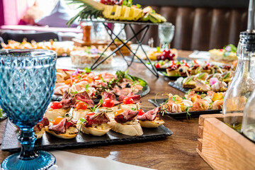 canape on the catering table - obrazy, fototapety, plakaty
