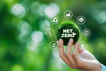 Hand holding Net zero icon and carbon neutral for net zero greenhouse gas emissions target Climate...