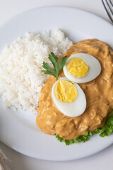 Aji de gallina chicken spicy cream served with rice traditional peruvian food