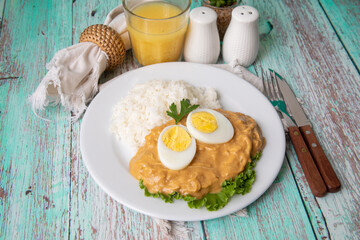 Aji de gallina chicken spicy cream served with rice traditional peruvian food