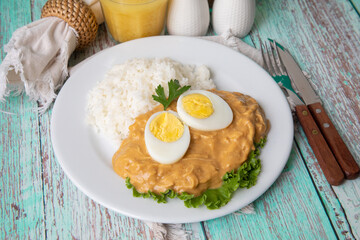 Aji de gallina chicken spicy cream served with rice traditional peruvian food