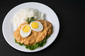 Aji de gallina chicken spicy cream served with rice traditional peruvian food