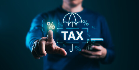 Businessman diligently using a smartphone to fill in the income tax online, Concepts of tax, VAT, taxation laws and money - obrazy, fototapety, plakaty