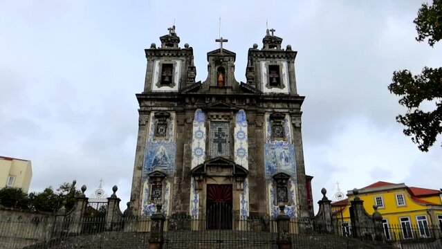 Unique church of Igreja de Santo Ildefonso in Porto with blue and white tiles of facade