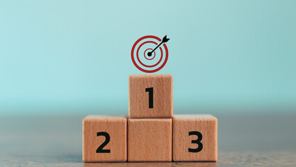Numbers 1,2, 3 of wooden building blocks. Ranking, business strategy, leader market, competitive advantage, benchmarking concept. Winner, leader, target achievement, success.