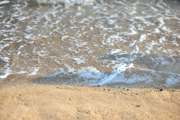 splashing water on the beach