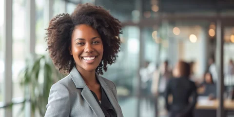 Foto op Plexiglas African American businesswoman with a welcoming smile, ready to make a successful client presentation © StockWorld