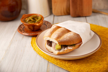 Mexican ham sandwich, in Mexico it is called Torta de Jamon, it is the most popular of the Mexican Tortas and the recipe varies depending on who prepares it, made with bolillo o telera bread.