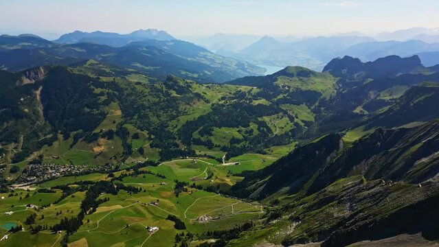 Drone shot revealing Brienzer Rothorn mountain range of the Emmental Alps, Switzerland, Europe