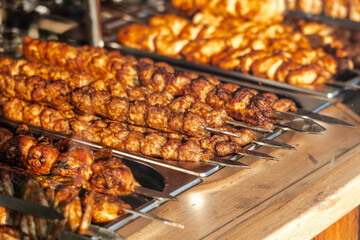 Fried meat on skewers on the grill