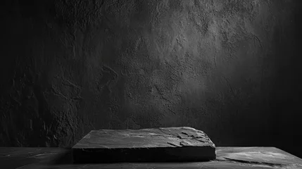 Fotobehang a black piece of slate podium on a dark background,black Stone rock podium with black background, for product display, presentation. © Planetz