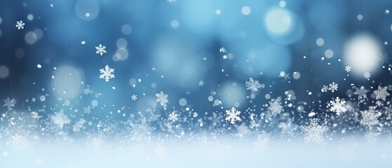 Winter wonderland: snowflakes and bokeh effect on a blue background