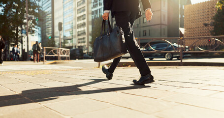 Legs, bag and business person walking, worker travel or commute to work in city with buildings....