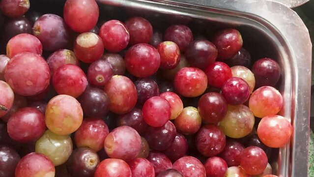 red grapes in a bowl