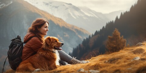 girl with a toller dog in the mountains