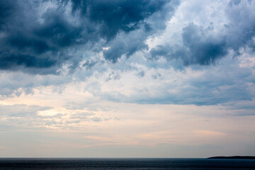 Landscape with sea and cloudy dramatic sky