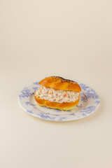 bagel with salmon tartare and cream sauce