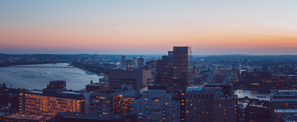 An aerial view of the Boston skyline at sunset.
