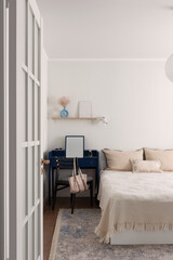 Vintage bedside bedroom area in beige