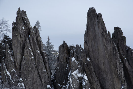 Group of Snow-Covered Rocks in a Winter Landscape