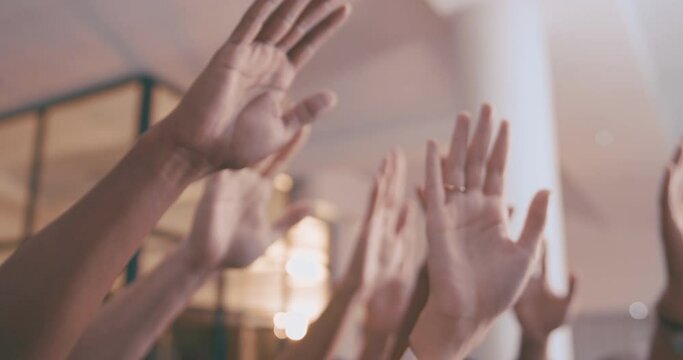 Business people, diversity and hands raised for question, interaction or teamwork at office. Closeup of employees or diverse group in vote, meeting or volunteer of community in unity at workplace
