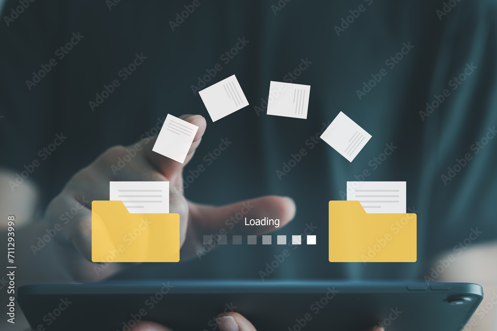 Fototapete Hand touch on document for send file between folder on internet. Data migration, Data transfer, Backup data, Exchange of file on folder, DMS. Virtual document loading to another folder.