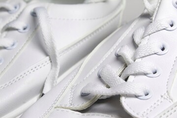 pair of white sneakers