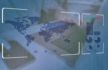 a controller is sitting behind screens monitoring shipment outlet locations on world map