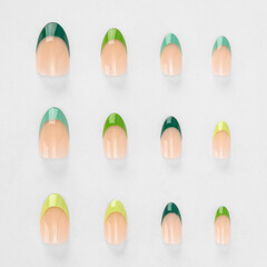 realistic set of colored false nails adhesive isolated on white background. top view. false nails acrylic nails for women. different fashion nail shapes.
