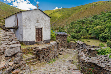 Chapel or small church among the ruins of the uninhabited village of Drave, the most isolated in...