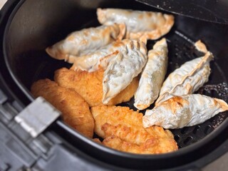 Dumplings and chicken nuggets baked in the air fryer