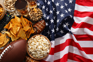 Beer with snacks, a rugby ball and an American flag