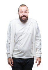 Fototapeta premium Young caucasian hipster man wearing sport clothes over isolated background looking stressed and nervous with hands on mouth biting nails. Anxiety problem.