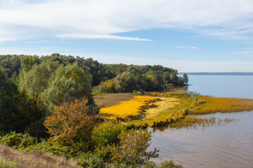 View of the Dnipro River from the high bank of the Trakhtemyriv Peninsula. Ukraine