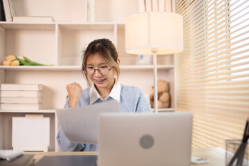 Extremely happy, Smiling young woman delighted or surprised with passing exams and good grades, Being successful makes you happy, Smiling and screaming for success, Doing winner gesture, YES.