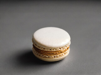 a macaron sitting on a monochrome background