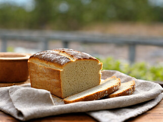 baked bread on the table, blurred nature background