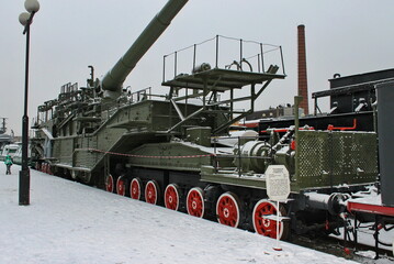 Exhibits of the railway transport museum in the open air in winter. Saint-Petersburg, Russia.