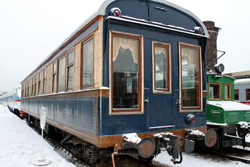 Exhibits of the railway transport museum in the open air in winter. Saint-Petersburg, Russia.