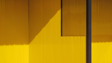 Yellow aluminium steel wall with black metal column of two street kiosks structure in under...