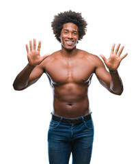 Afro american shirtless man showing nude body over isolated background showing and pointing up with fingers number ten while smiling confident and happy.