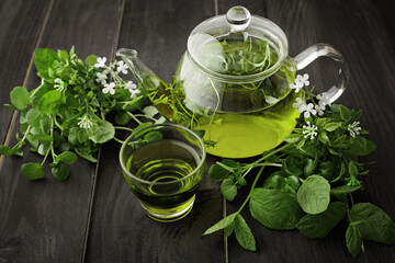 herbal tea on rustic wooden background - 711353917