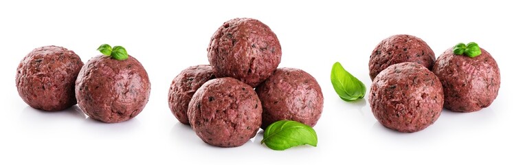 Fototapeta na wymiar Raw vegan meatballs with basil leaves isolated on white background. With clipping path.