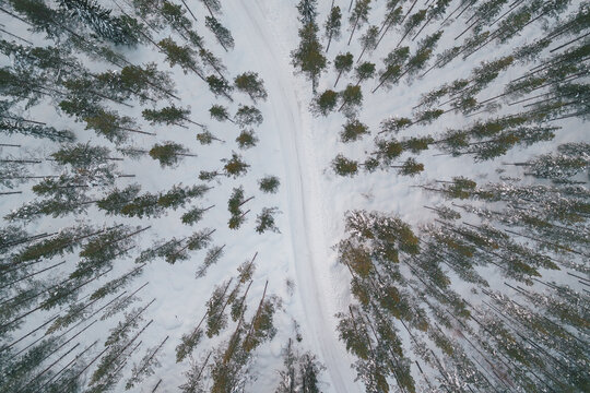 Drone view over Scandinavian winter road
