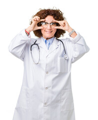 Middle ager senior doctor woman over isolated background Trying to open eyes with fingers, sleepy and tired for morning fatigue