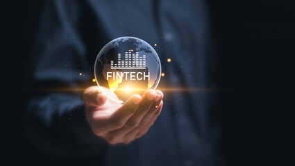 Fintech (financial technology) and digital money concept. Person hold virtual globe with fintech...