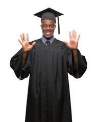 Young graduated african american man over isolated background showing and pointing up with fingers number ten while smiling confident and happy.