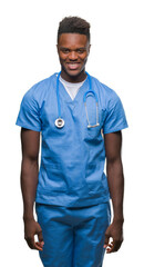 Fototapeta premium Young african american doctor man over isolated background wearing surgeon uniform with a happy and cool smile on face. Lucky person.