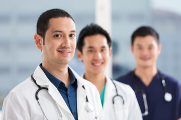 Team of male doctors and medical support staff